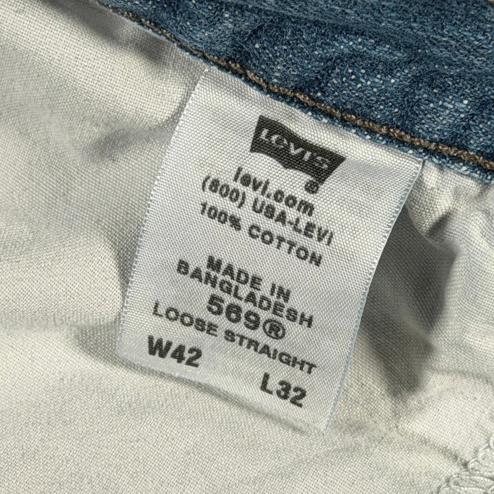 Levis 569 Loose Straight Jeans Mens 42x32 Light Wash Blue Denim 005692450